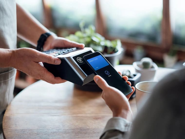 A business payment being made at a counter